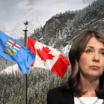 Danielle Smilth with Canada and Alberta's flag