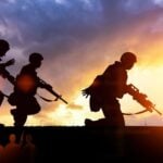 California sparks fight after troops sent north to Oregon