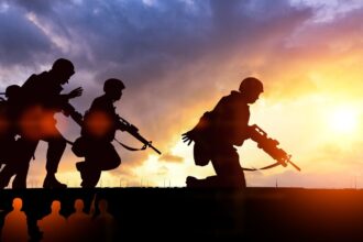 California sparks fight after troops sent north to Oregon